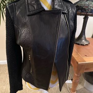Genuine leather and knit jacket.